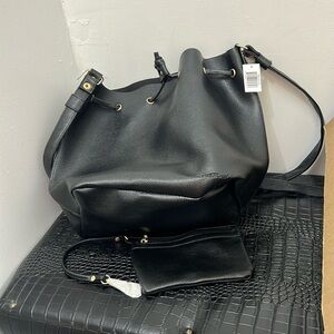 Bella Russo, NWT with make up bag